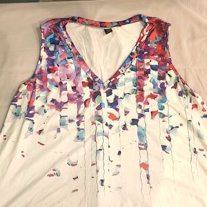 White and colorful sleeveless blouse